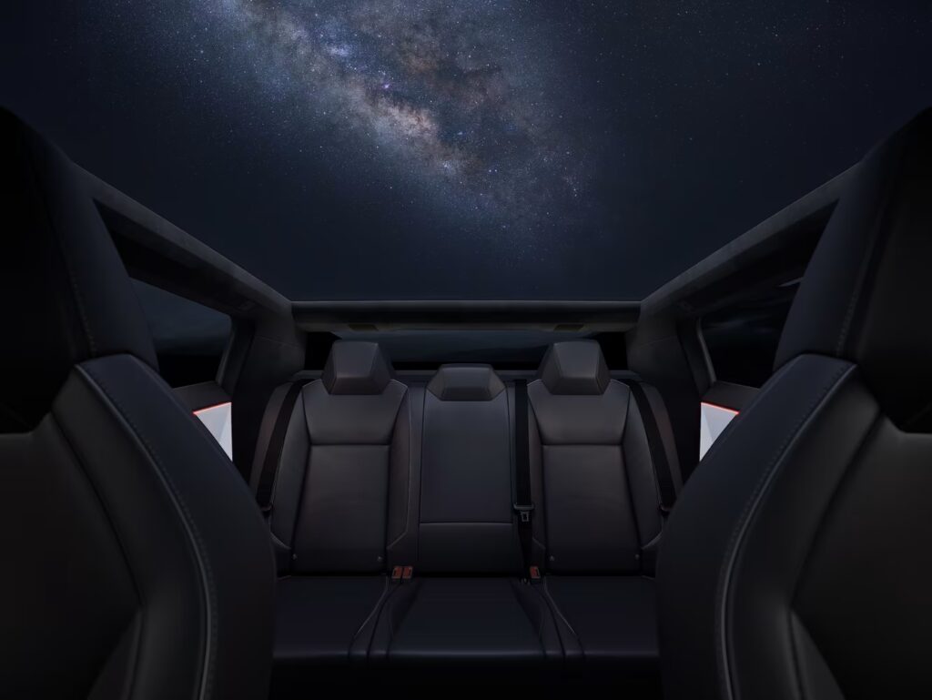Image of Tesla Cybertruck in motion on rugged terrain with text: “Unlock Referral Bonus Today"