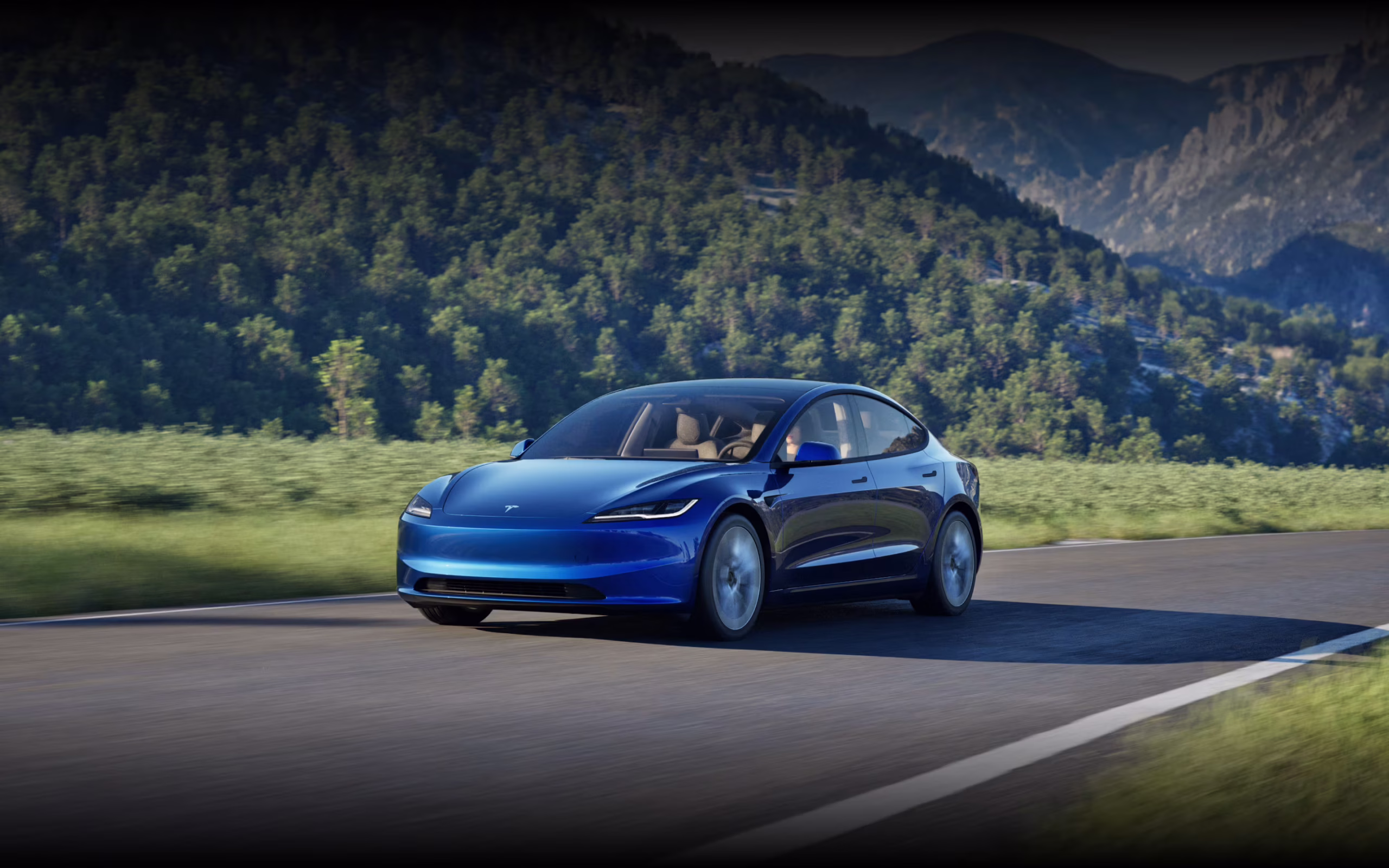 Tesla Model 3 interior featuring touchscreen and referral savings