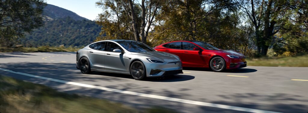 Tesla Model S parked at a Supercharger station - referral rewards
