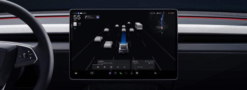 Tesla Model Y interior featuring touchscreen and referral savings