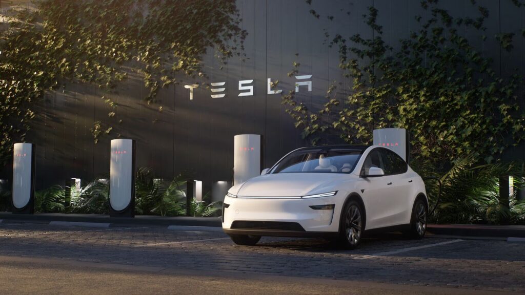 Tesla Model Y and other EVs charging at a station in 2025, showing market competition.